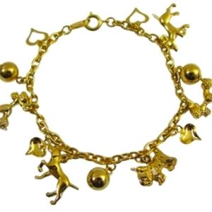 Gold Trifari Lover Charm bracelet